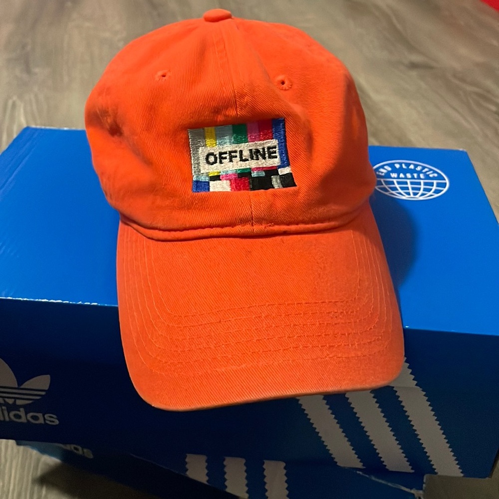 A orange off-line Zumiez hat